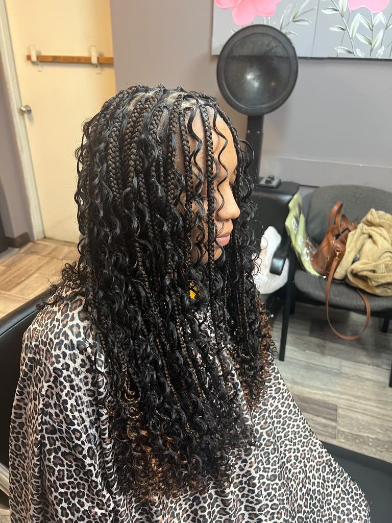 Long boho knotless braids with curly human-hair accents