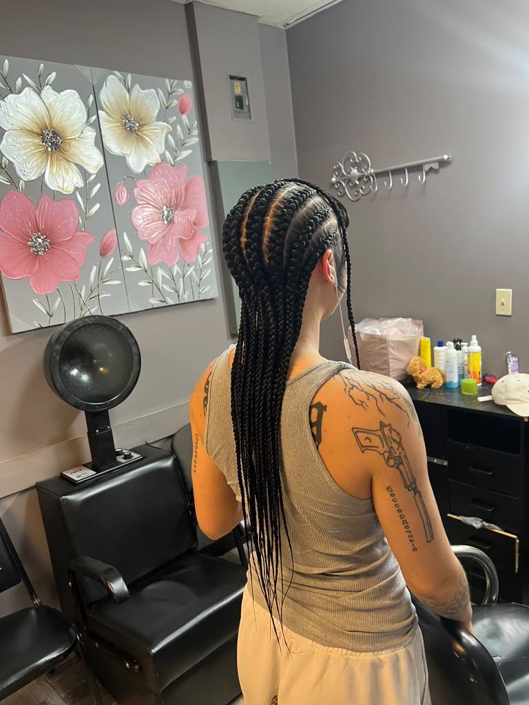 Long stitch feed-in cornrows, viewed from the back