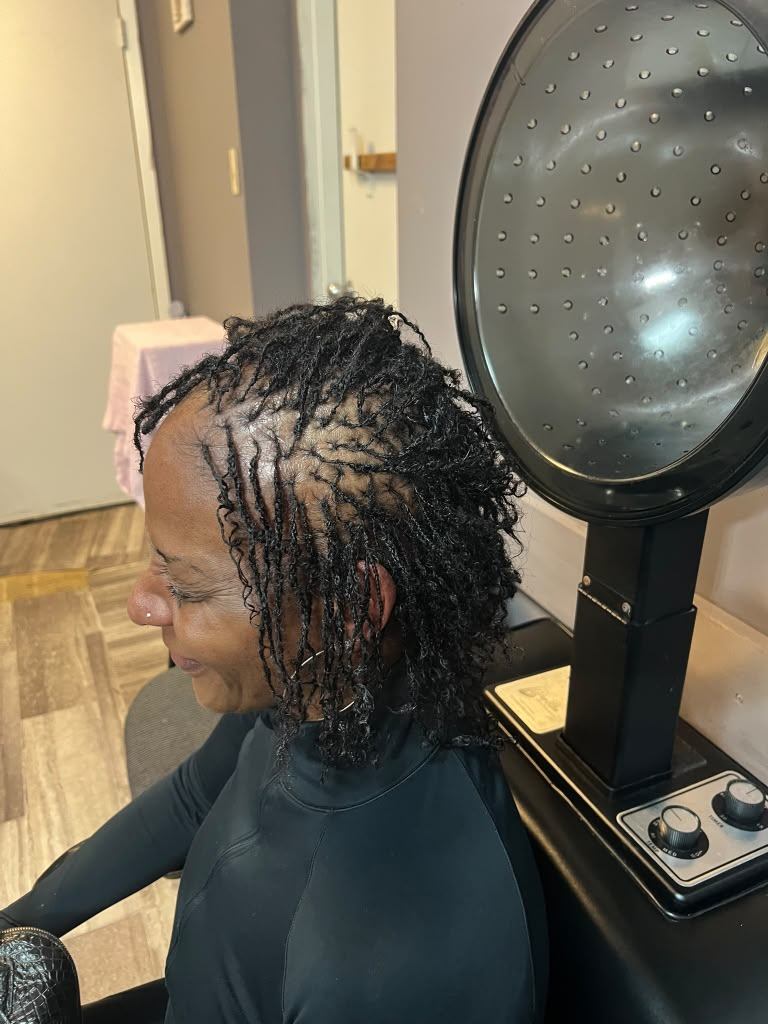 Fresh loc retwist with defined curls