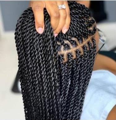 Long black rope twists with triangle parts