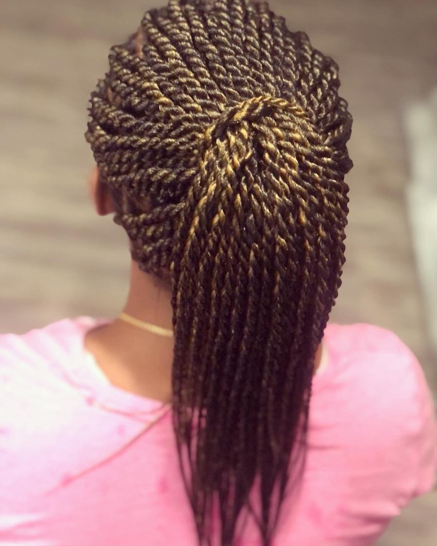 Two-tone Senegalese twists swept into a ponytail